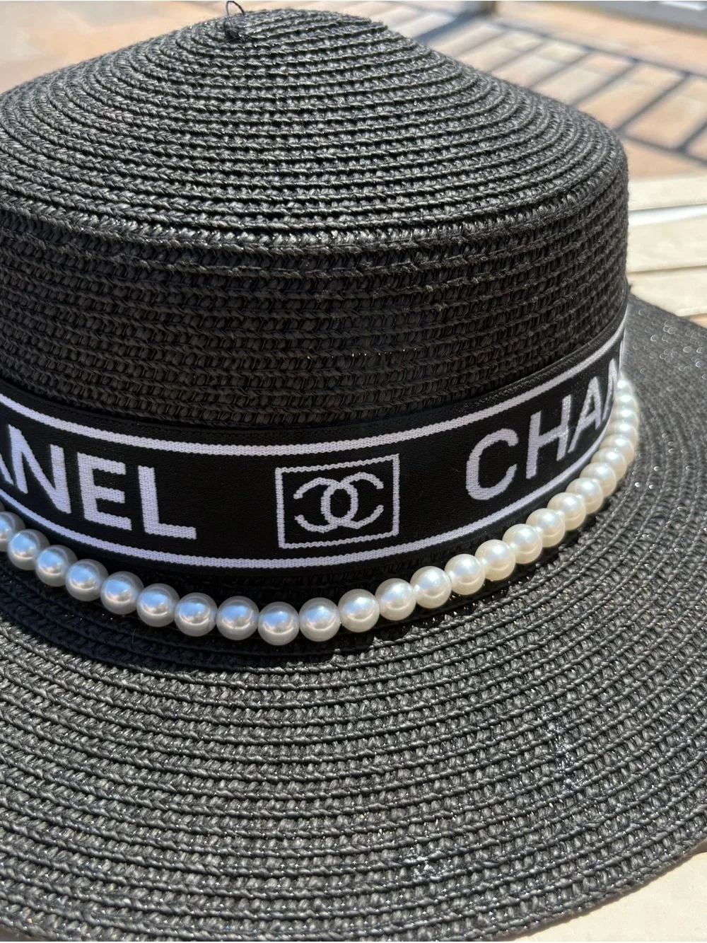 CHANEL Black Straw Hat with Logo Band and Pearl Trim - Picture 2 of 5